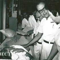 Dr Robert Wochos, Surgeon, Rotation I, and unknown nurse.